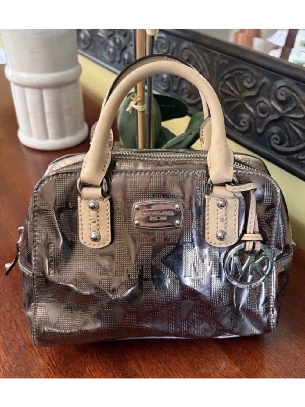 Michael Kors Metallic Silver Mini
Satchel w/Monogram MK Charm - Picture 1 of 10